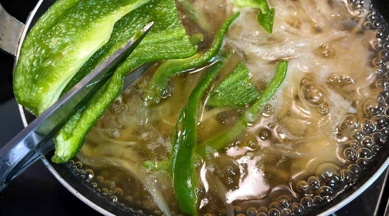 snipping_bell_peppers_with_scissors